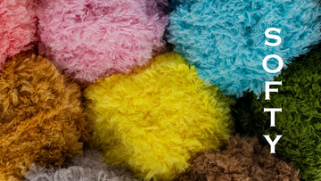 Bright, fluffy Estako Softy plush chenille yarn in many colors, the kind used for no-crochet tie sweaters.