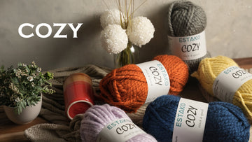 Colorful skeins of Estako yarn arranged as a banner, illustrating 2026 crochet color and texture trends.