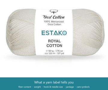 A real Estako Royal Cotton ball band showing fiber content, brand, net weight and yardage, with a yarn-label fields legend — Estako Yarns.