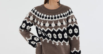 A model in an oversized taupe Fair-Isle sweater knit from Estako MegaStar wool-blend yarn.