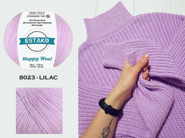 Skeins of Estako wool-blend yarn, including soft merino-cashmere Happy Wool and chunky Cozy, in a warm autumn palette.